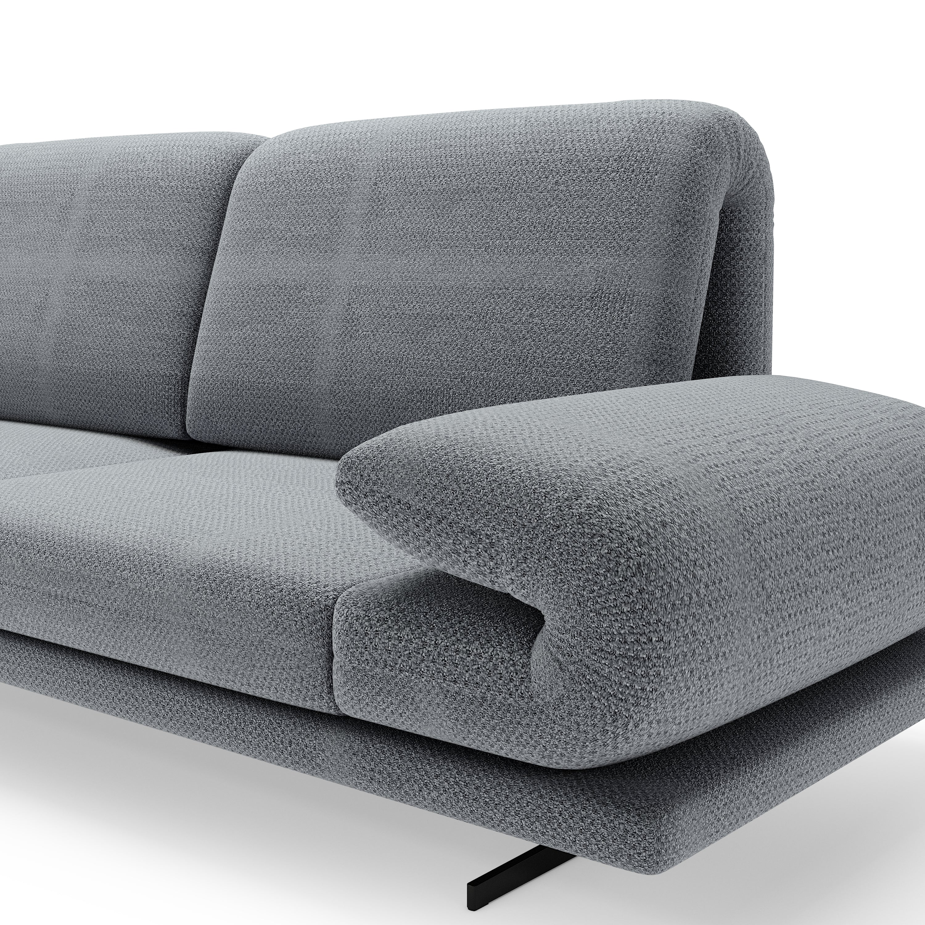 Detailansicht eines modernen Sofas in Hellgrau mit strukturierter Polsterung und markanter Armlehne.