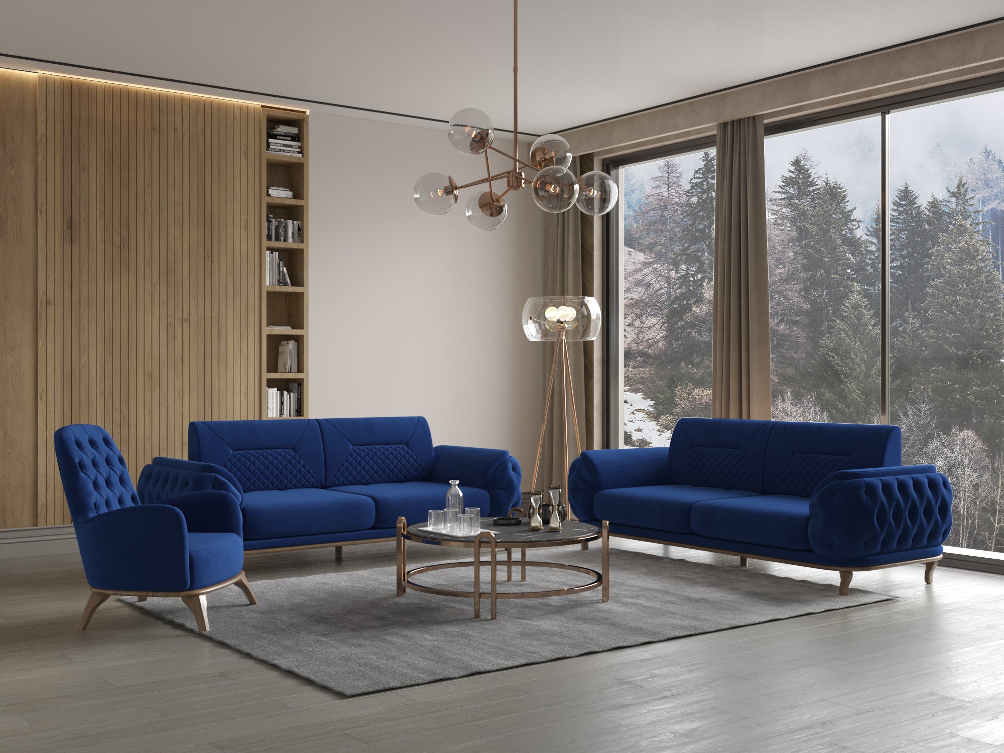 Modernes Wohnzimmer mit blauer Polstergarnitur aus zwei Sofas und Sessel, rundem Couchtisch und großer Fensterfront mit winterlichem Ausblick.